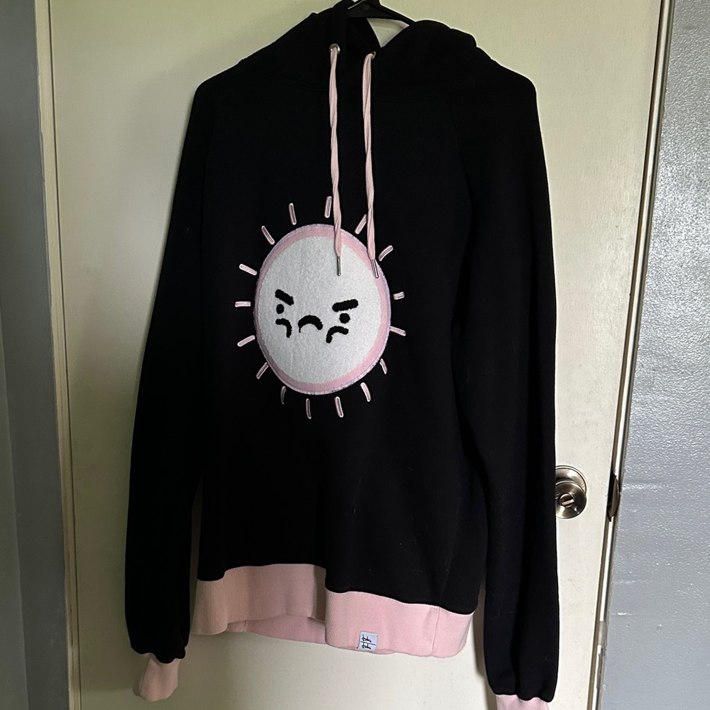 Tsuki market pink and black sun set